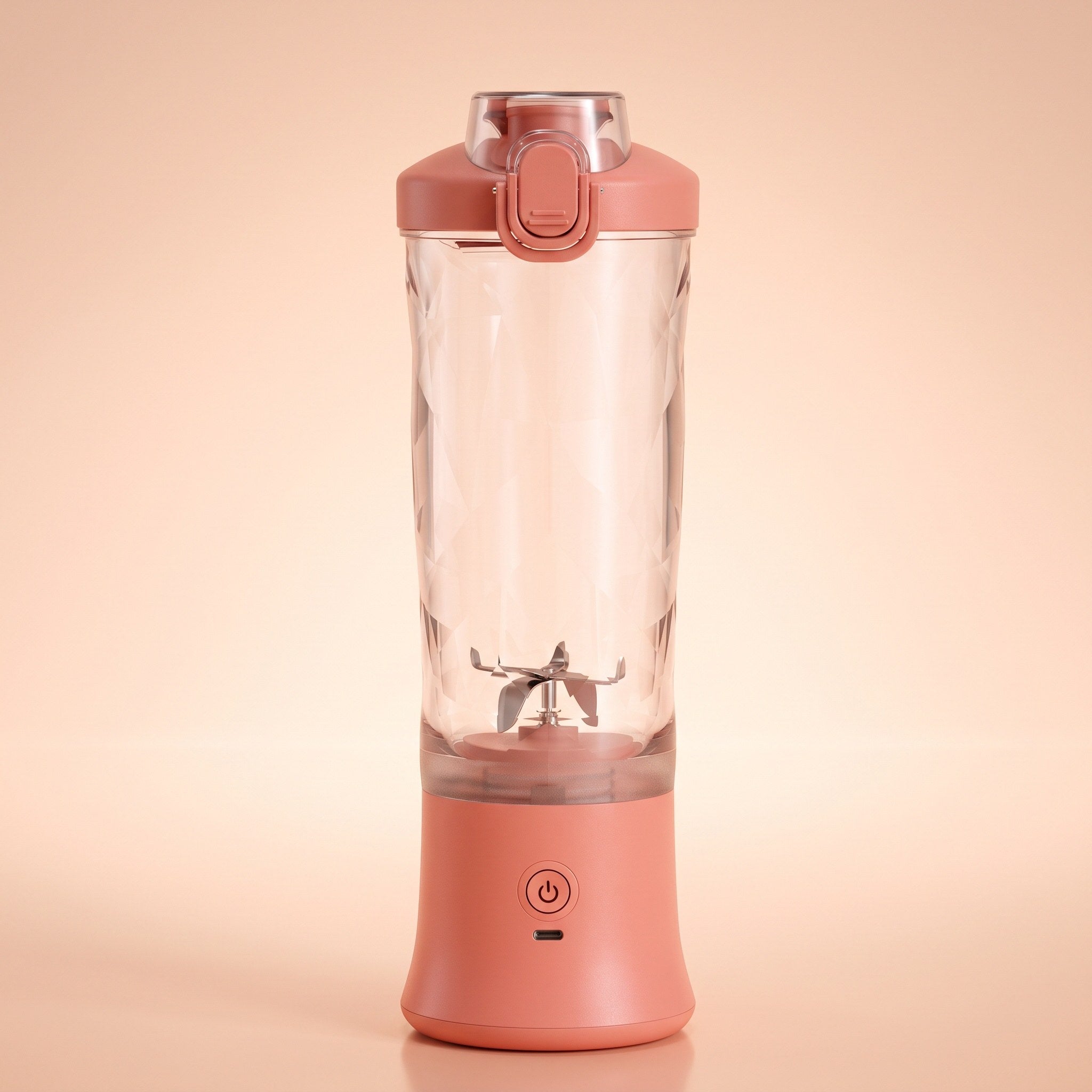 Pink blender with its green-tinted cup